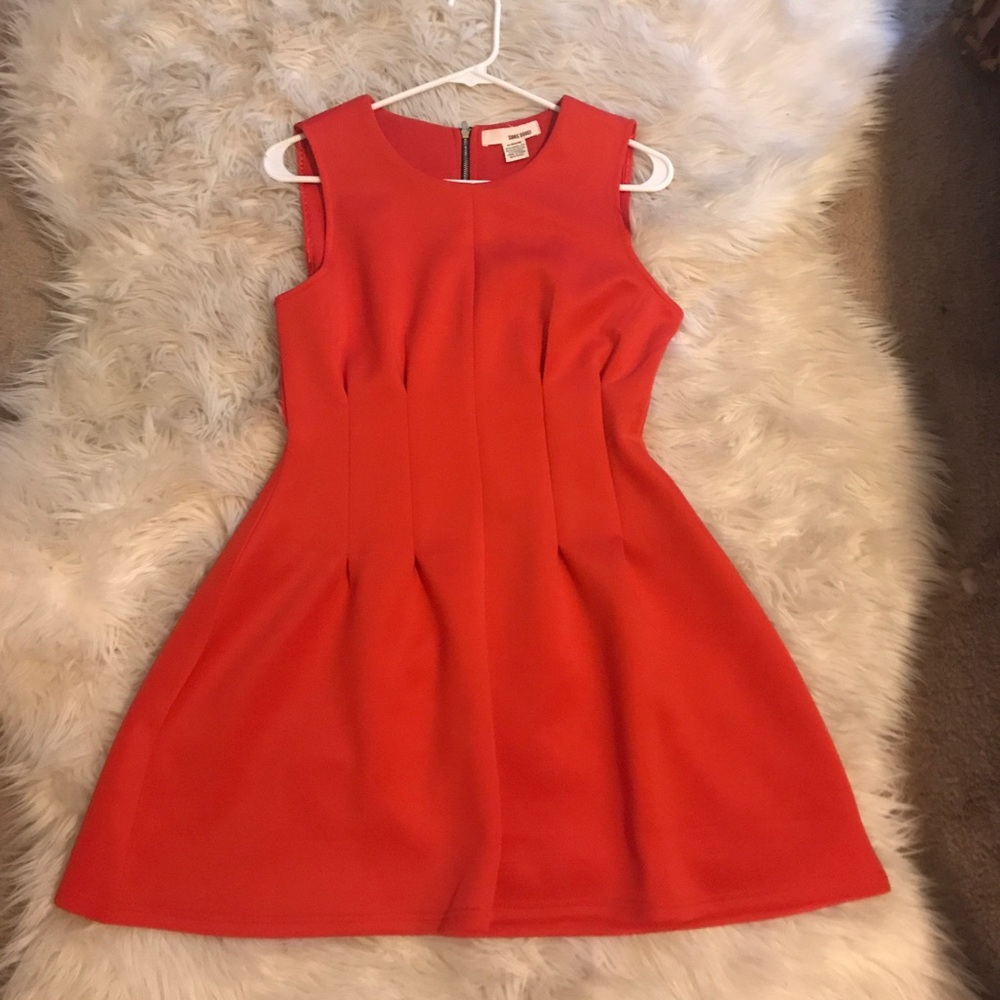 A SANS SOUCI red dress stretch.